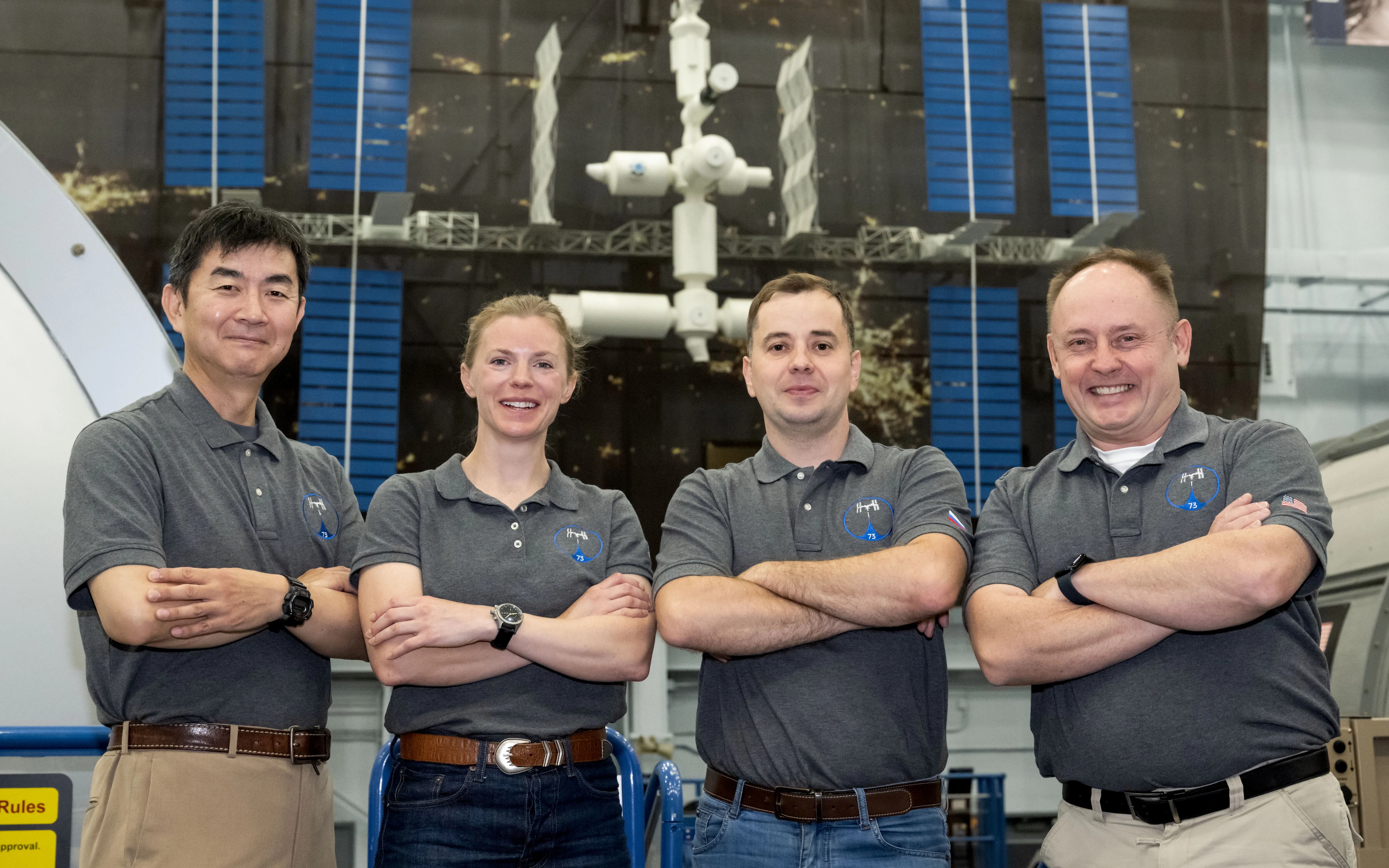 NASA’s SpaceX Crew-11 members stand inside the Space Vehicle Mockup Facility at the agency’s Johnson Space Center in Houston. From left are Mission Specialist Kimiya Yui from JAXA (Japan Aerospace Exploration Agency), Commander NASA astronaut Zena Cardman, Mission Specialist Oleg Platonov of Roscosmos, and Pilot NASA astronaut Mike Fincke.
