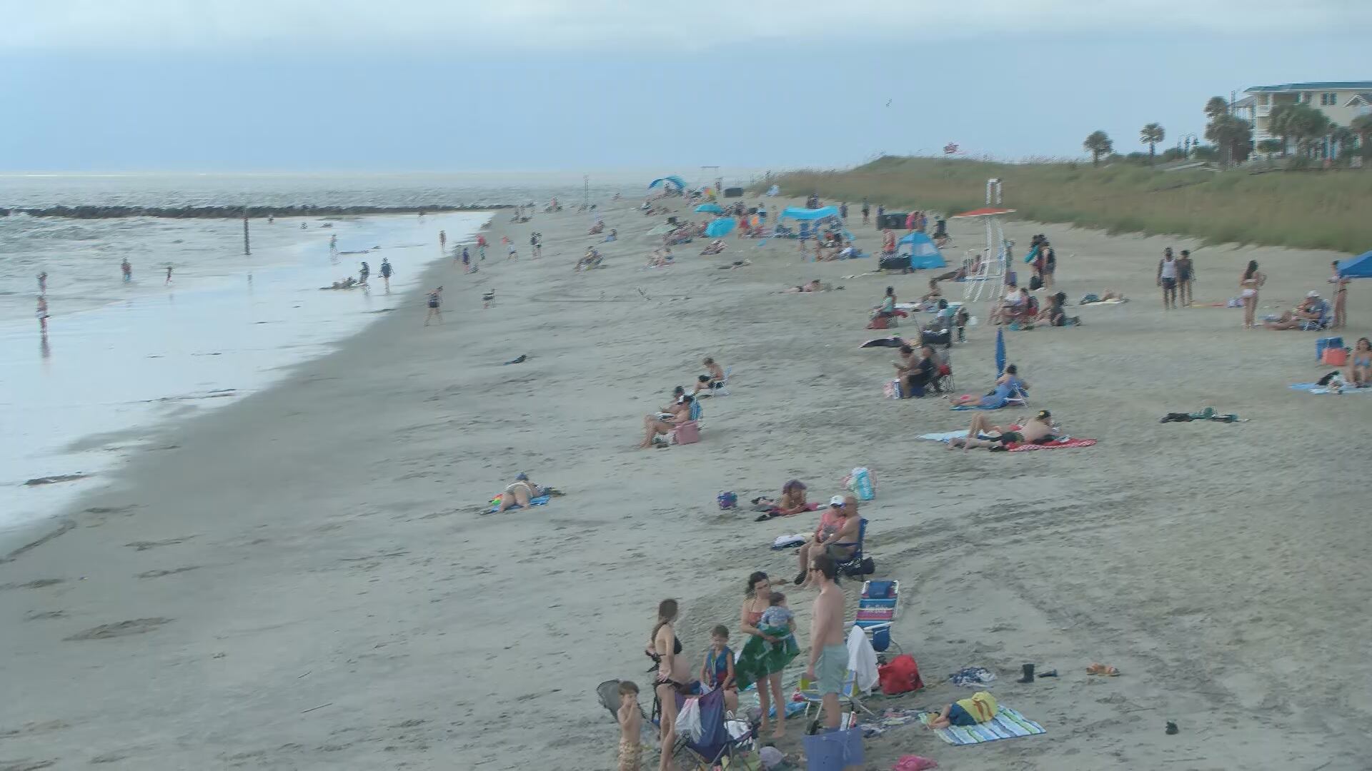 Sun, rain and jellyfish: Beachgoers brave mixed weather on Tybee Island for Labor Day