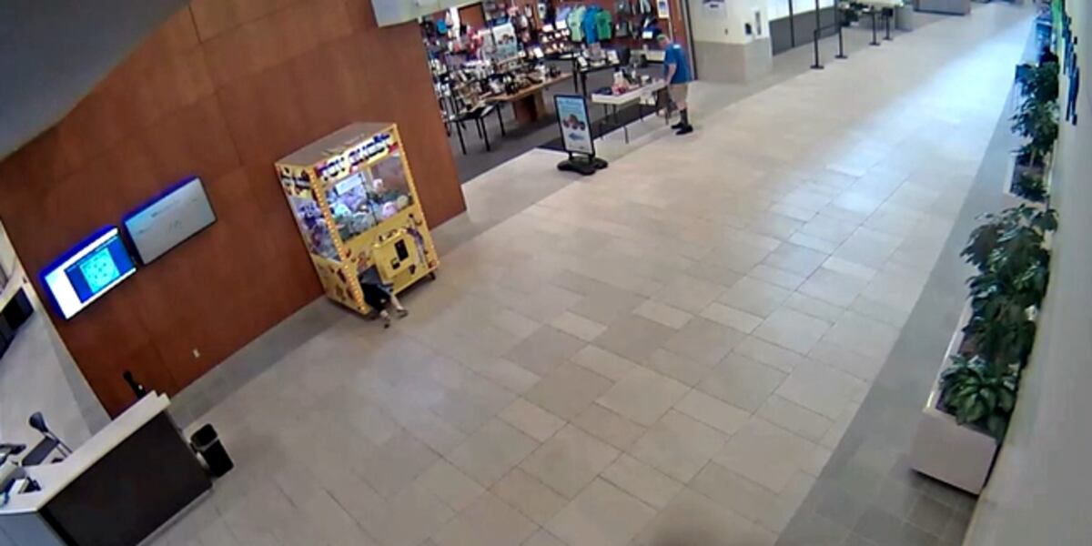 Child rescued after climbing into claw machine, getting stuck