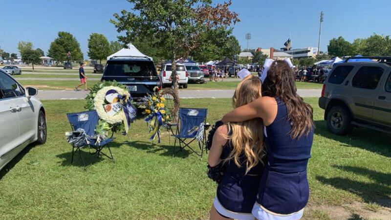 Georgia Southern Cheerleaders mourn the loss of a teammate's parents