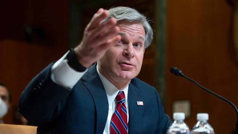FILE - FBI director Christopher Wray testifies during a Senate Appropriations Subcommittee...