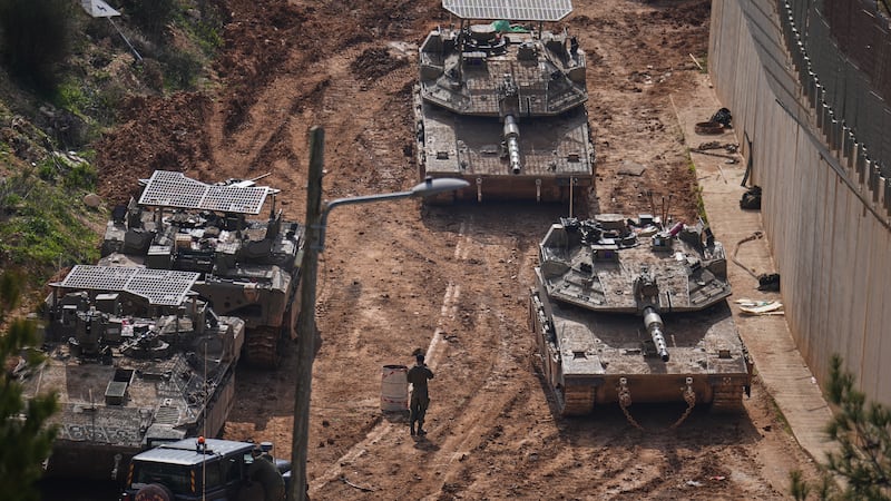 Israeli tanks maneuver near the Israel-Lebanon border, in northern Israel, Wednesday, March 4,...