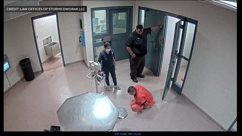 Family sues over inmate's death after video was released showing he was on his hands and knees...