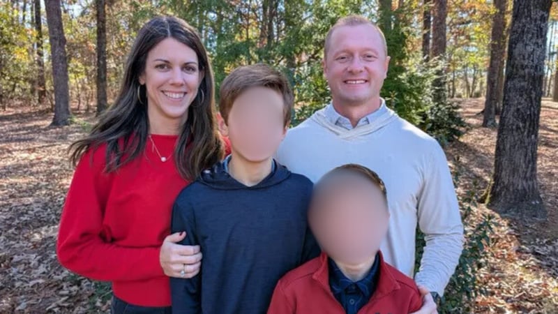 North Hall High School teacher Jason Hughes, pictured with his wife, Laura, also a teacher,...