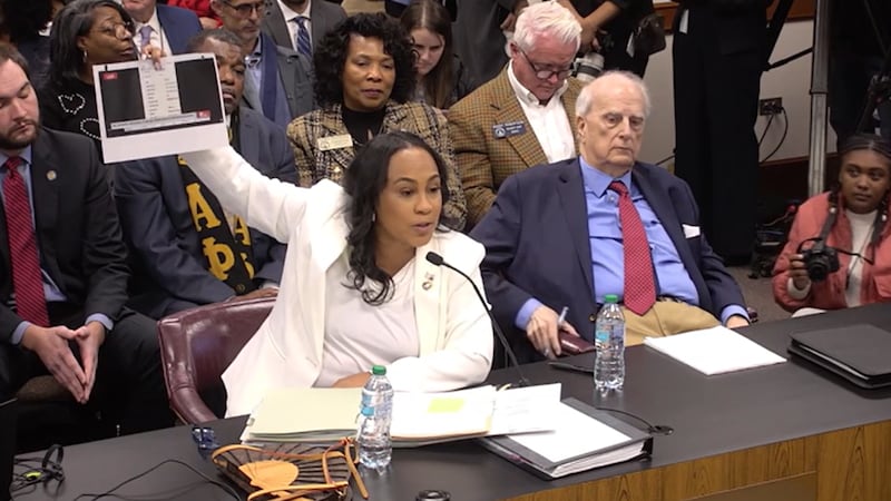 (L-R) Fulton County DA Fani Willis and her attorney, former Georgia governor Roy Barnes,...