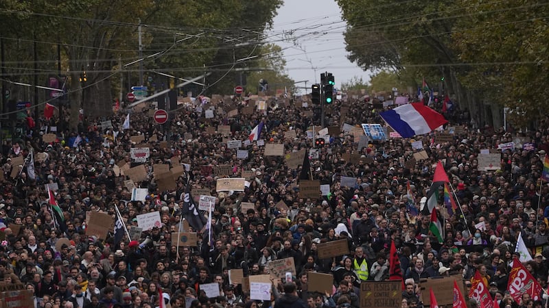 Protesters march during a demonstration against rising living costs in Paris, Saturday, Oct....
