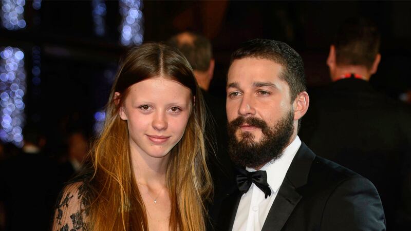 FILE - Mia Goth, left, and Shia LaBeouf appear at the premiere of the film "Fury," during the...