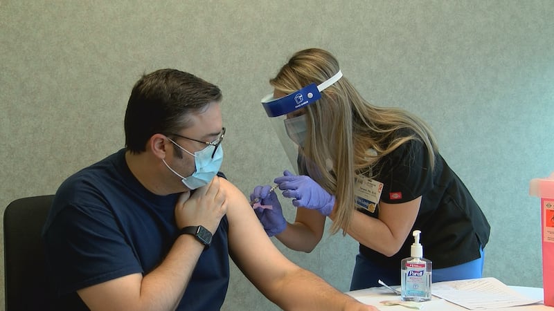 Memorial Health's Dr. Thacker gets his COVID-19 vaccine